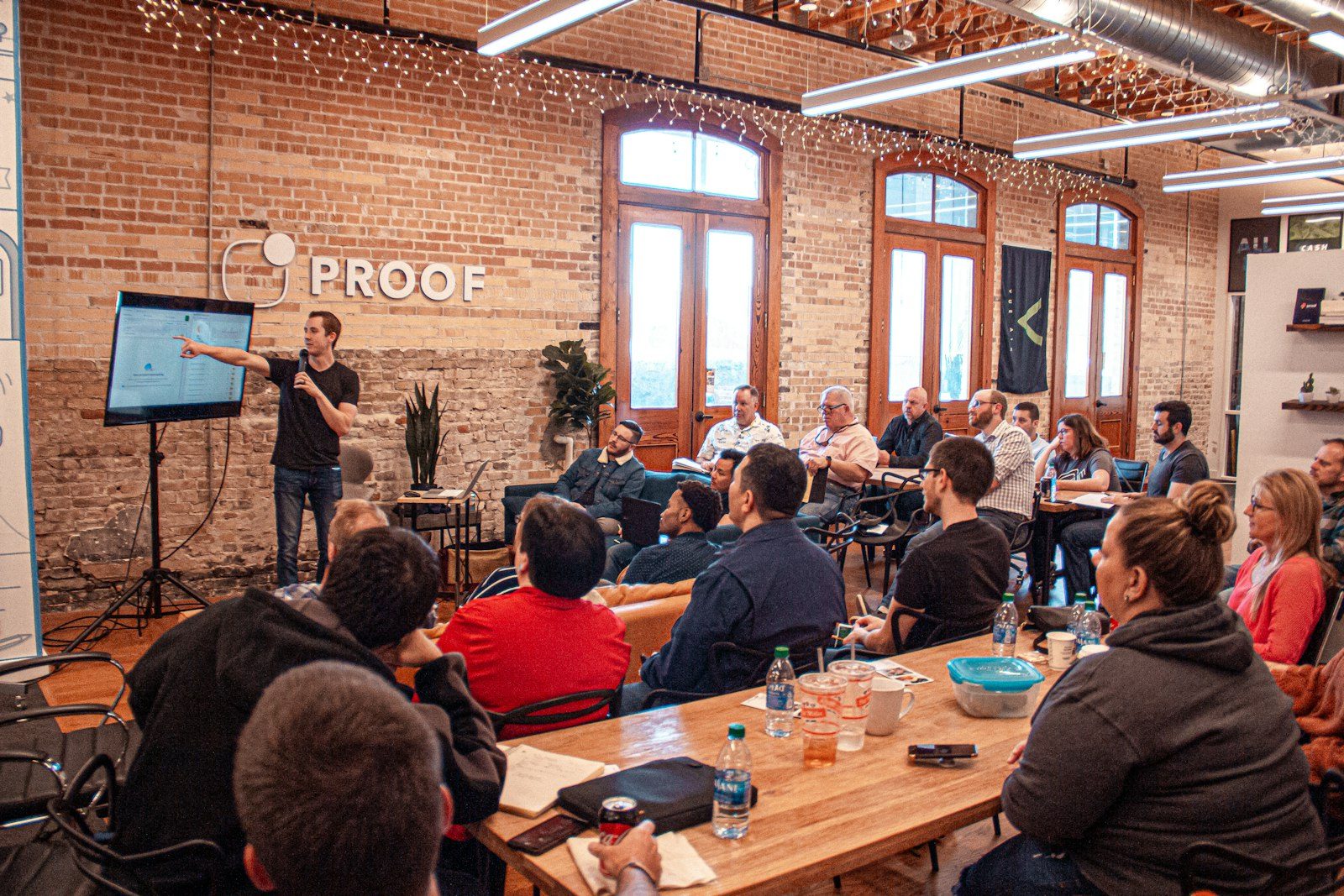 A speaker addressing a room of practitioners