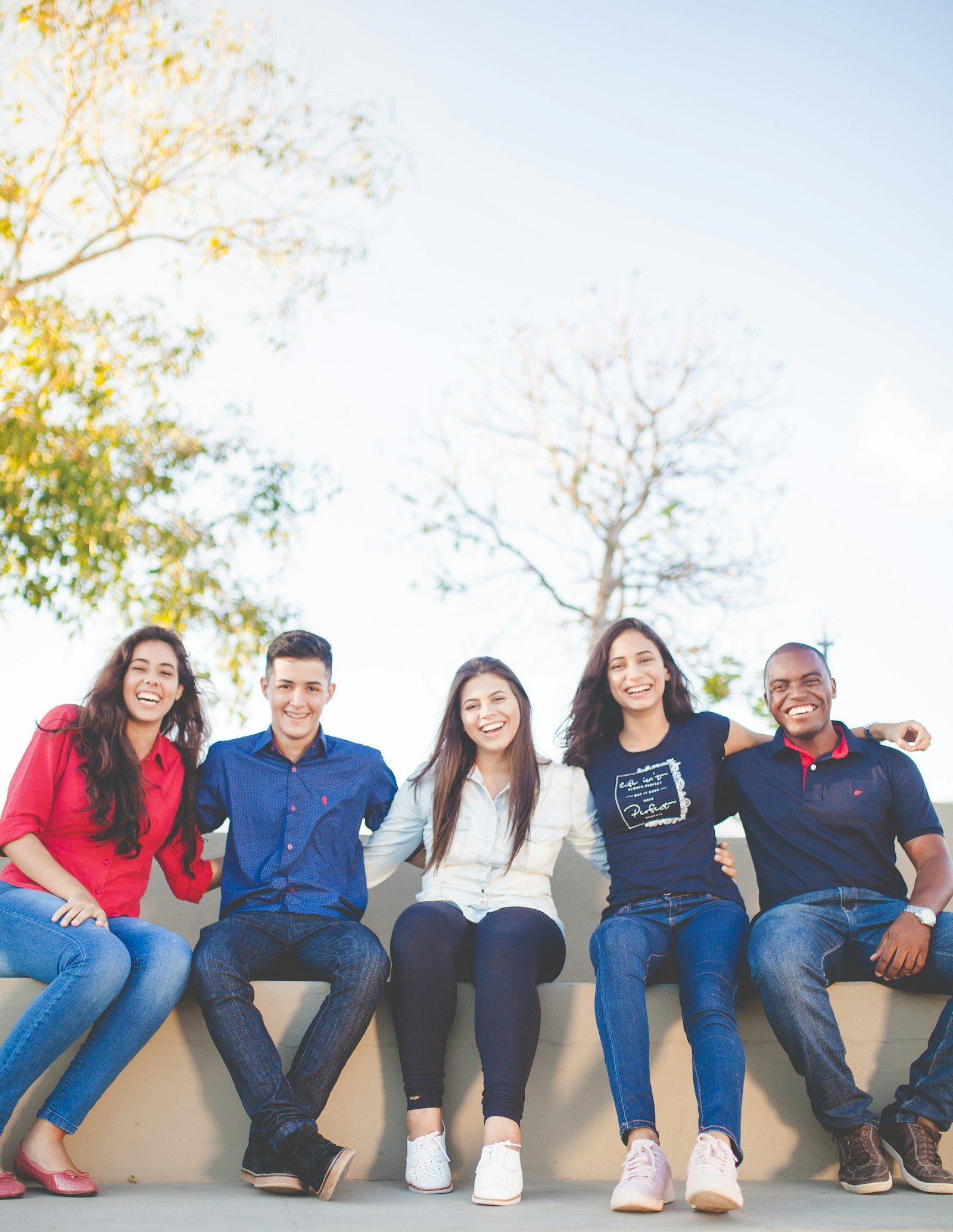 A group of students sitting together outdoors